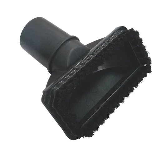 A black vacuum dusting brush on a white background