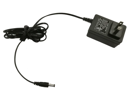 A black charging adapter on a white background