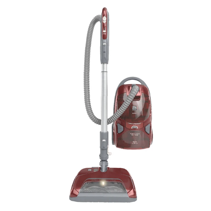 Red canister vacuum on white background