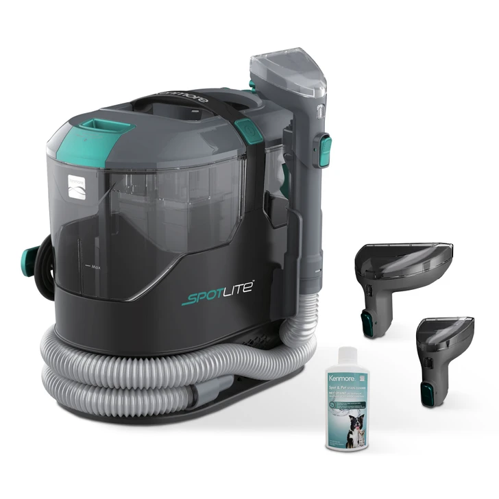 Spot cleaner with included accessories on white background