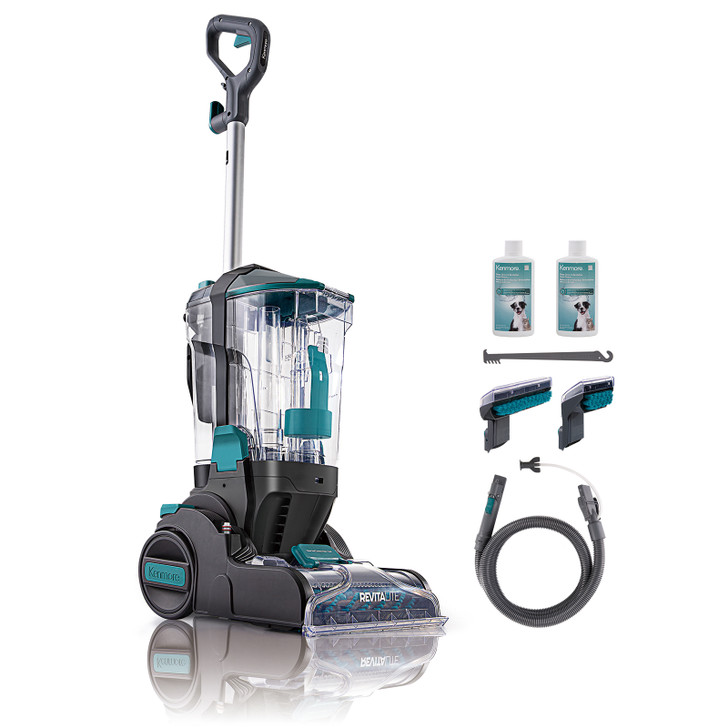 Kenmore RevitaLite carpet cleaner with accessories and two bottles of cleaning solution on a white background
