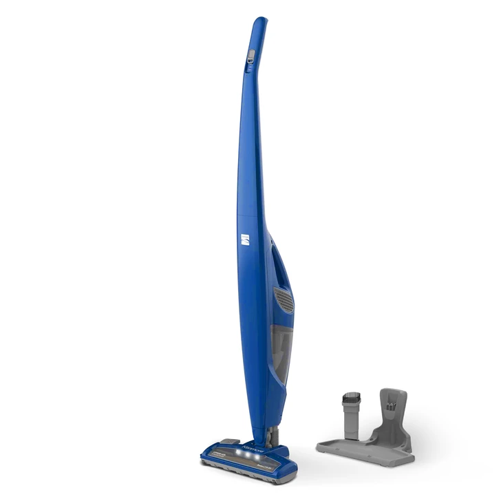 Blue stick vac with accessory attachment and charging base on whitebackground
