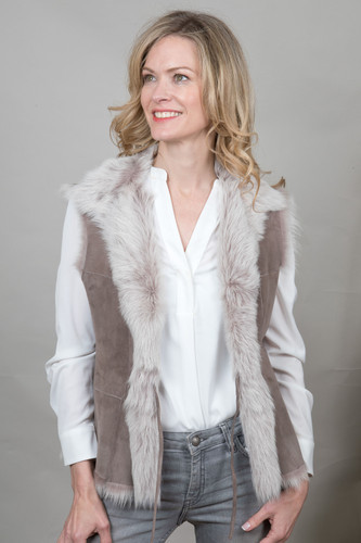 The Timeless Choice: Why a Real Fur Gilet Outshines its Synthetic Counterpart