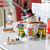 After a long day of building toys, Santa and his elves love to stop at Snowy's Diner. Built from a vintage train dining car, the campy snowman design sets the causal vibe of the atmosphere inside. Set of 2 includes roadside sign. After a long day of building toys, Santa and his elves love to stop at Snowy's Diner. Built from a vintage train dining car, the campy snowman design sets the causal vibe of the atmosphere inside. Set of 2 includes roadside sign.