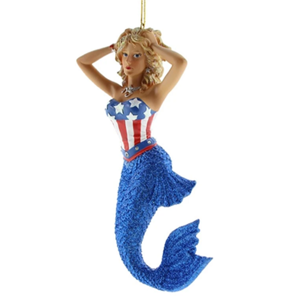 Star Mermaid by December Diamonds showcases the star and stripes on top of a fantastic sparkly blue tail. 90809