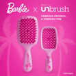 A glamshot of the Barbie UNbrush showing the words "Shine Bright" at the top of the brush. A glamshot of the Barbie UNbrush showing the words "Shine Bright" at the top of the brush.