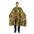 A men wearing a green camouflage patterned hair cutting cape.