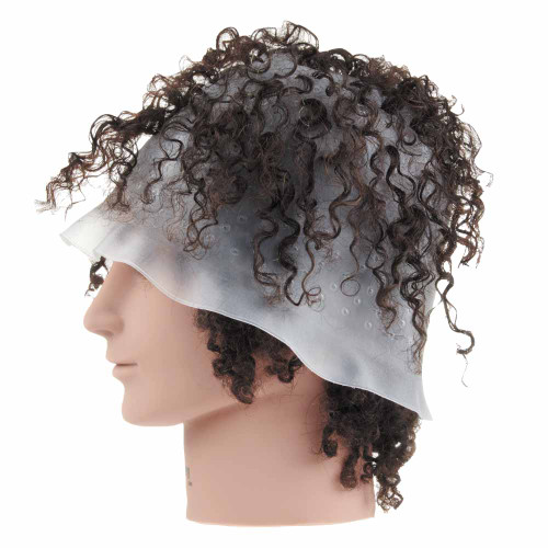 Salon mannequin that has Silicone Tipping Cap on head with hair through the guide holes, demonstrating its use.