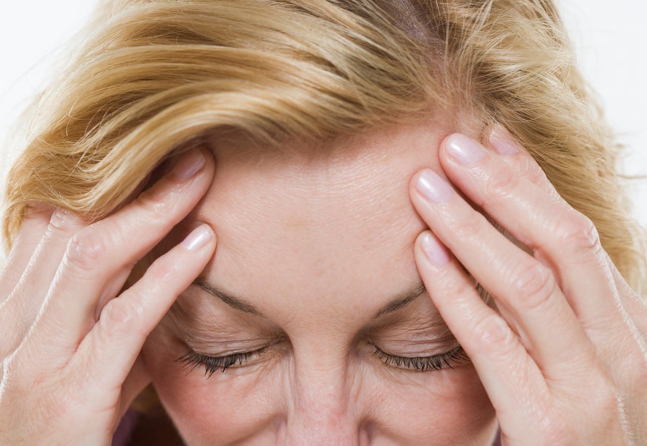 Learn how to address Headaches During Menopause