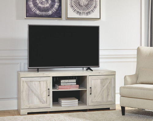 The Bellaby Whitewash 4 Pc. Entertainment Center 63 TV Stand is available  at Discount Furniture Center proudly serving South Hill and Farmville, VA  and surrounding areas!