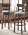 Valebeck Brown Tall Upholstered Swivel Barstool Valebeck Brown Tall Upholstered Swivel Barstool