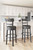 Valebeck Black Tall Upholstered Swivel Barstool