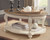 Realyn White / Brown Oval Cocktail Table