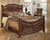 Leahlyn Warm Brown Queen Panel Bed
