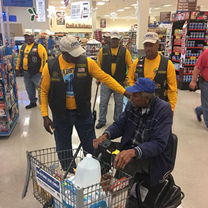 The Buffalo Soldiers purchasing groceries for veterans.