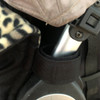 Side velcro tabs attach to the pram