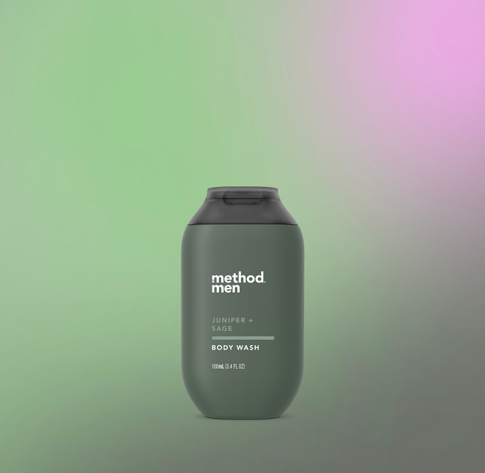 Front of Method Travel Size Juniper + Sage body wash 3.4 fl. oz. displayed in a dark
green bottle.