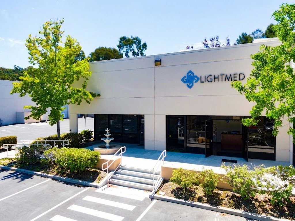 LIGHTMED USA office with entrance, fountain, and landscaping