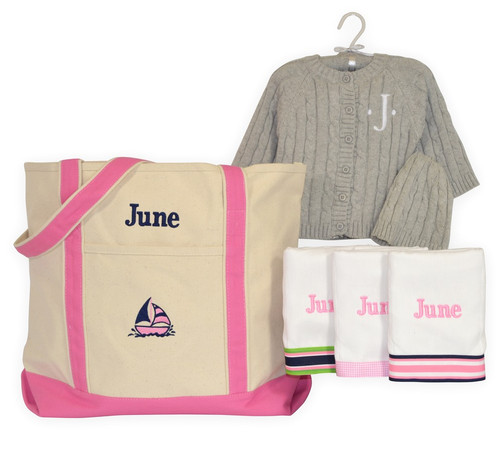 canvas tote bag, cable knit sweater, hat and burp cloths