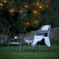 Cane-line Breeze highback chair in the garden.