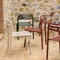 Bliss chairs and armchairs in Desert Red, Dark Green and Sand.