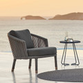 Cane-line Moments lounge chair at sunset.