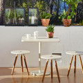 Area stools in White by Cane-line.