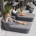 Cane-line Basket daybeds in Graphite with women seated.