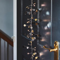 Lightstyle London Confetti (Gold) - LED Lights adorning door.