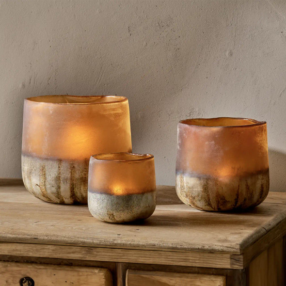 Small, Medium and Large Ngolo Tealight Holders in Antiqued Amber colour by Nkuku.