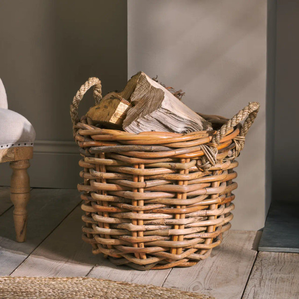 Rattan Chunky Basket filled with cut logs.