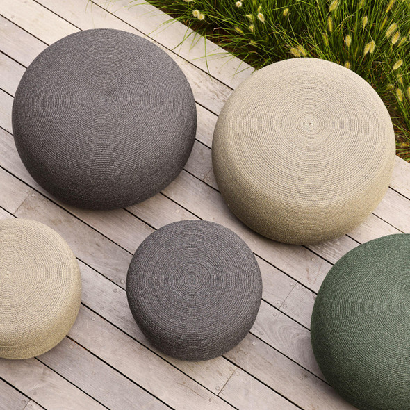 Cane-line Circle footstools large in Dark Grey, Taupe and Dark Green.