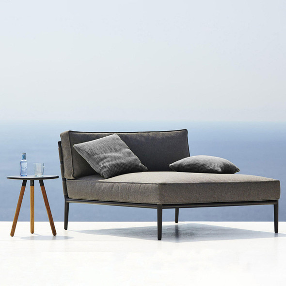 Cane-line Conic daybed in Grey by the ocean.