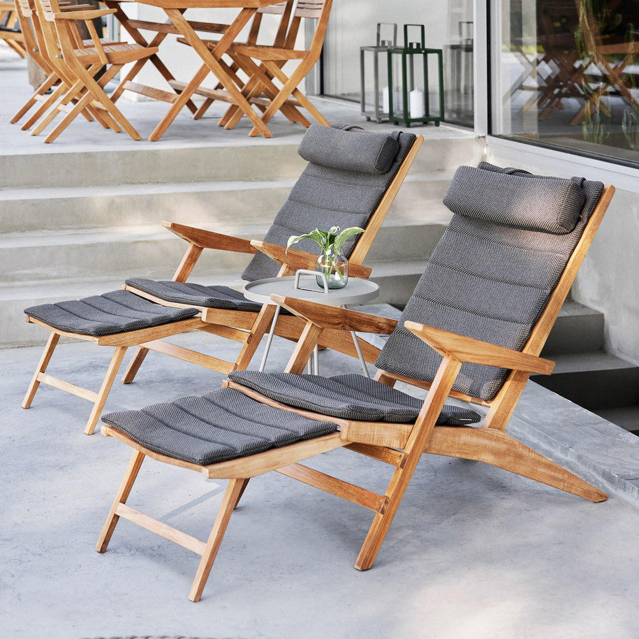 Cane-line Flip deck chairs with Dark Grey cushions.