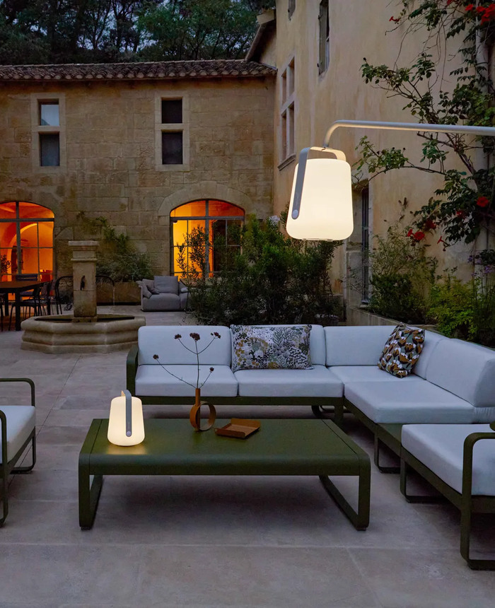 Outdoor lounge seating at dusk