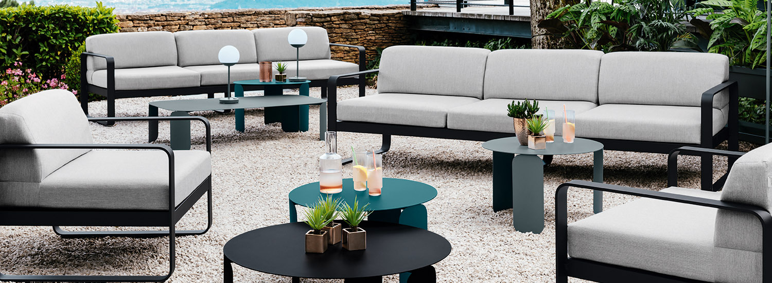 Fermob outdoor lounge furniture arranged on a terrace