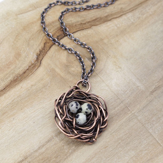 bird nest pendant of copper wire.