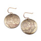 Bronze earrings with a mandala design