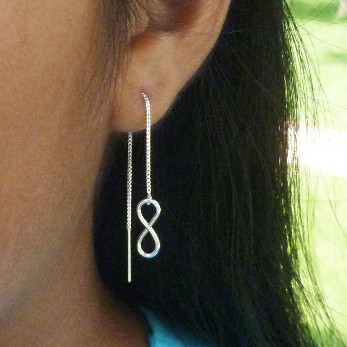 sterling silver Infinity threader earrings shown as an example of how they can be worn.