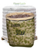 Pallet of 36 Roots Organics Formula 707 soil bags with an open sample bag showing mix.