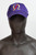 Purple Nike dad cap with embroidered gold Omega symbol and red lightening bolt on front panel. White Nike Swoosh embroidered on the left side panel. 