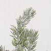 tall rustic tree dusted with faux snow and mini pinecones in a rustic hessian sack