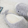 Close-up of gray whale slipper opening and stitched toe detail