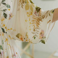 Full-length Garden Bloom viscose lounge dress with flutter sleeves and midi hem