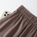 Close-up of pewter gray lounge pants elastic waistband and side pocket
