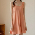 Front view of orange Essential modal sleeveless lounge dress on model