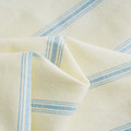 Close-up of the soft cotton weave and fine blue stripe texture