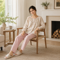 Woman seated in Blush Pink floral cotton lounge set