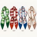 Reversible satin twilly scarves in green diamond, red diamond, blue floral and beige chain prints