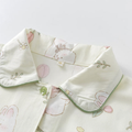 Rounded collar and green piping detail on bamboo cotton pajama top
